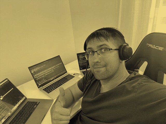 Tomas at his desk